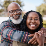 African American couple hugging each other